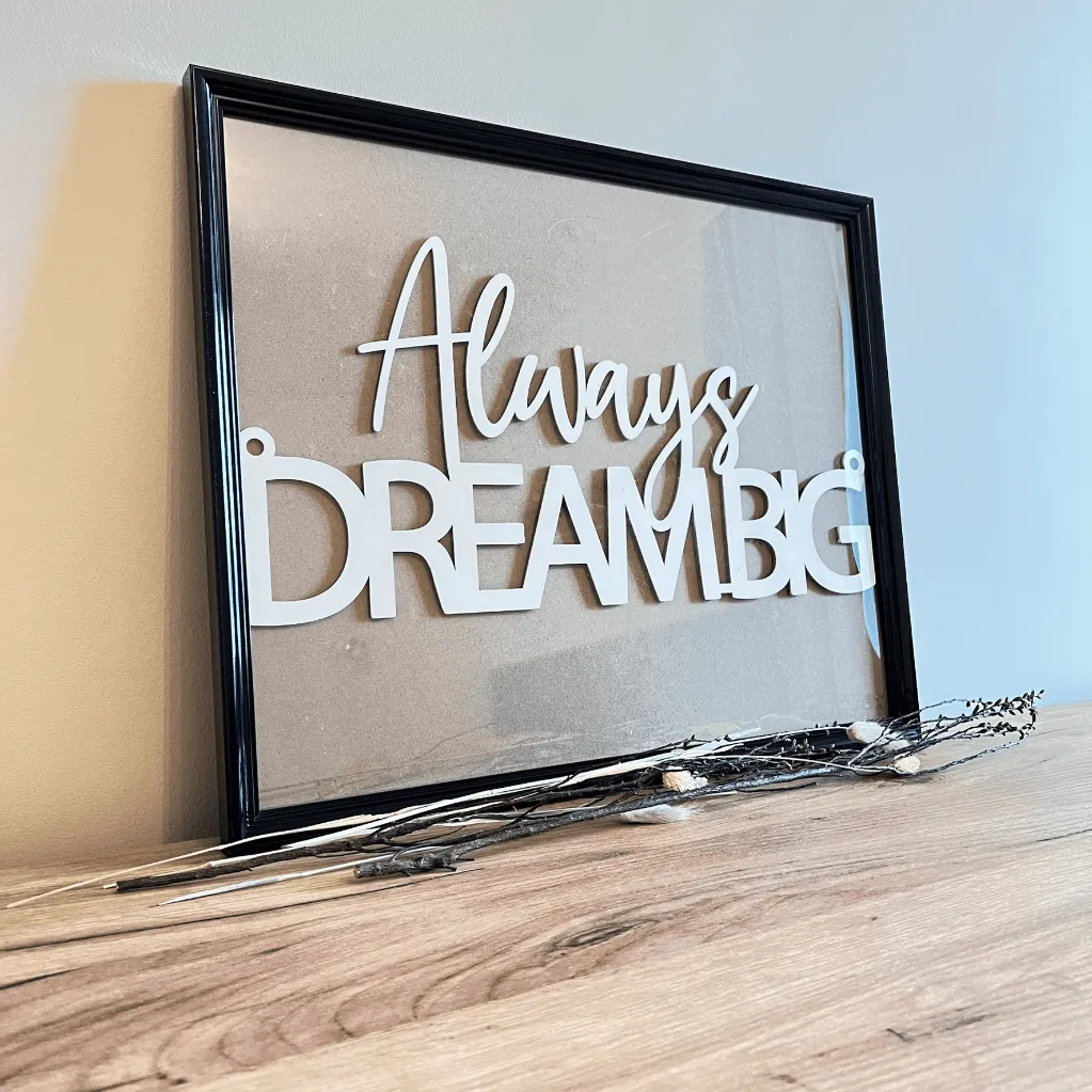A00582-motivschild-always-dream-big-holz-weiß-wanddekoration-im-bilderrahmen.webp