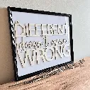 A00347-different-doesnt-mean-wrong-wanddeko-holz-natur-skylaser-im-bilderrahmen.webp