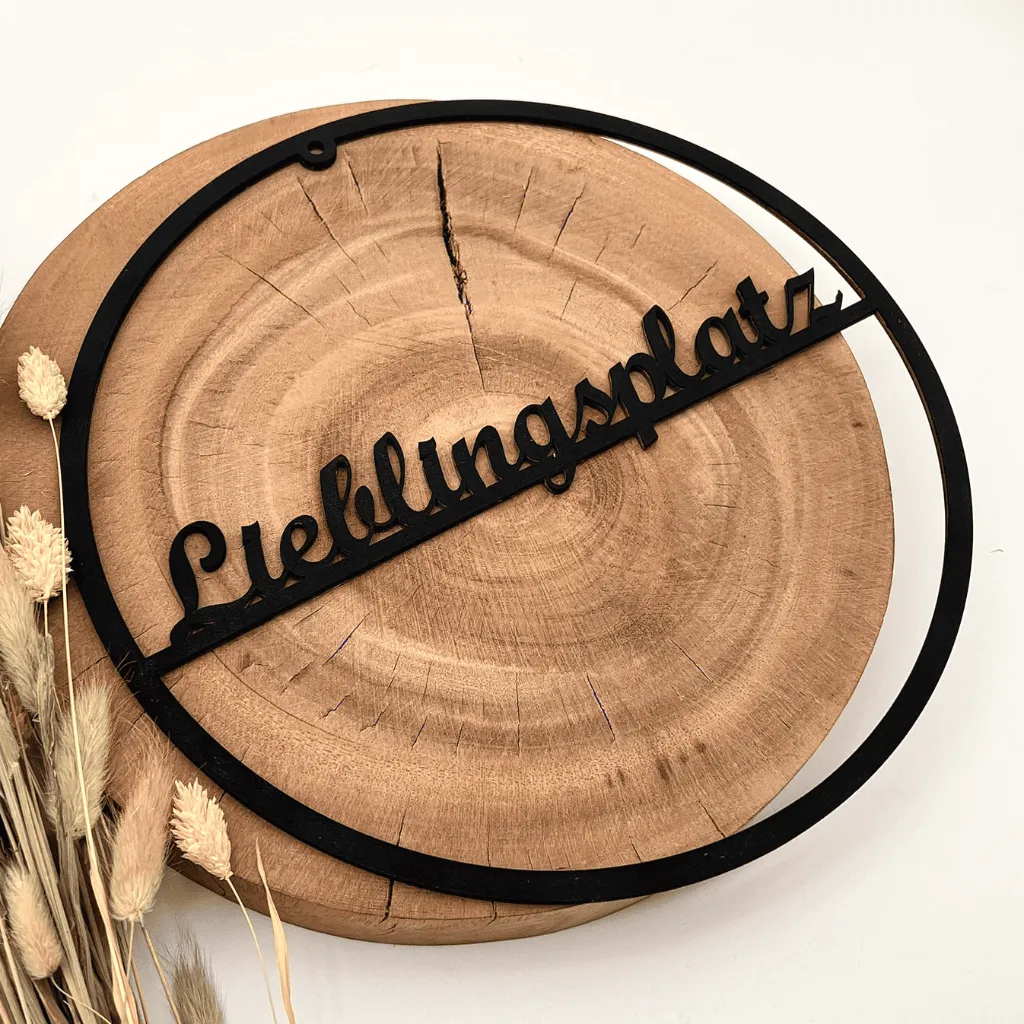 A00438-holz-wanddeko-lieblingsplatz-schwarz-rund-modern-seitlich.webp